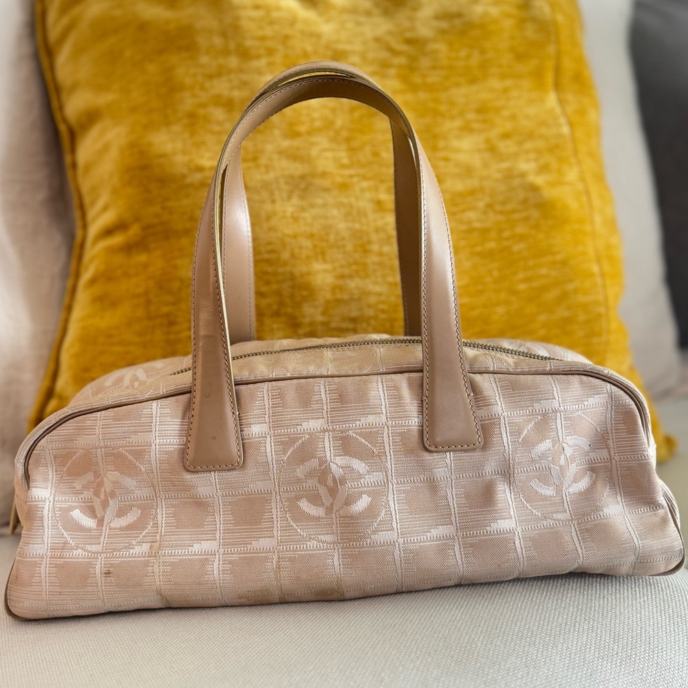 CHANEL 
Nylon Travel Bowler Beige